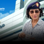 Foto Susi Pudjiastuti dengan latar gedung Bank BJB